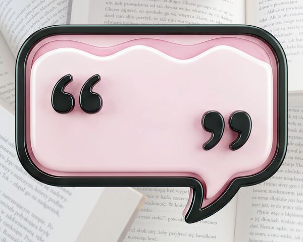 guillements de citation sur fond rose